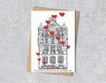 Wedding / Anniversary card with a black and white textile illustration of 30 James Street Liverpool and red hearts with personalised text.