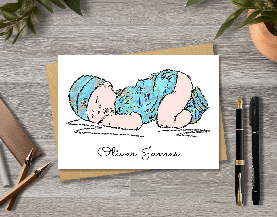Greeting card with textile illustration of a baby boy with personalised text.