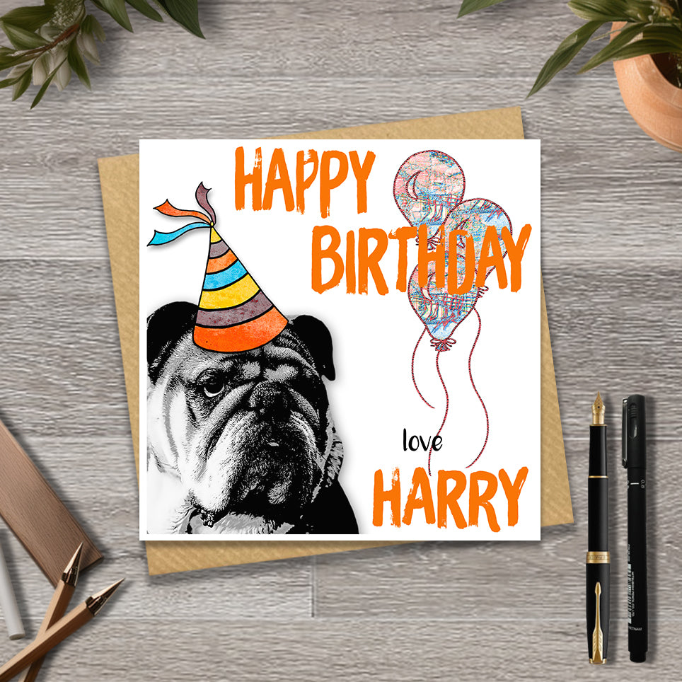 Birthday card with a British Bulldog wearing a party hat and balloons, with personalised text.
