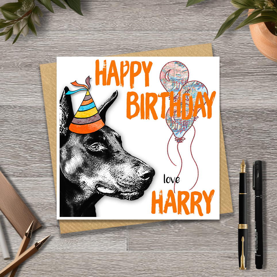 Birthday card with a Doberman wearing a party hat and balloons, with personalised text.