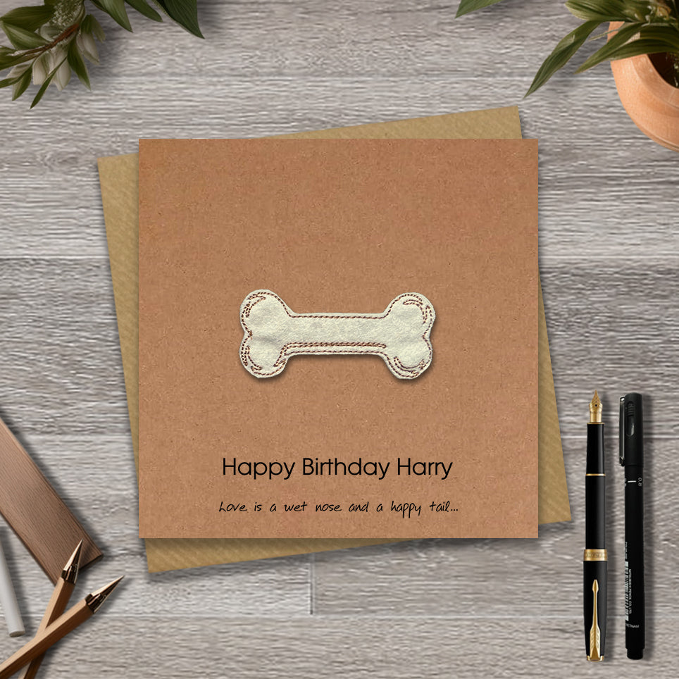 Brown birthday card with a embroidered bone design and personalised text 