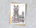 Wedding / Anniversary card with a black and white textile illustration of Ely Cathedral Cambridge and red hearts with personalised text.