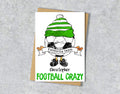 Greeting card with a cartoon character wearing a green and white striped hat, text 'Favourite team Christopher' and 'FOOTBALL CRAZY' 
