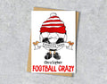 Greeting card with a cartoon character wearing a red and white striped hat, text 'Favourite team Christopher' and 'FOOTBALL CRAZY' 