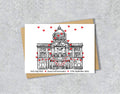 Wedding card with a black and white textile illustration of Hull City Hall and red hearts with personalised text