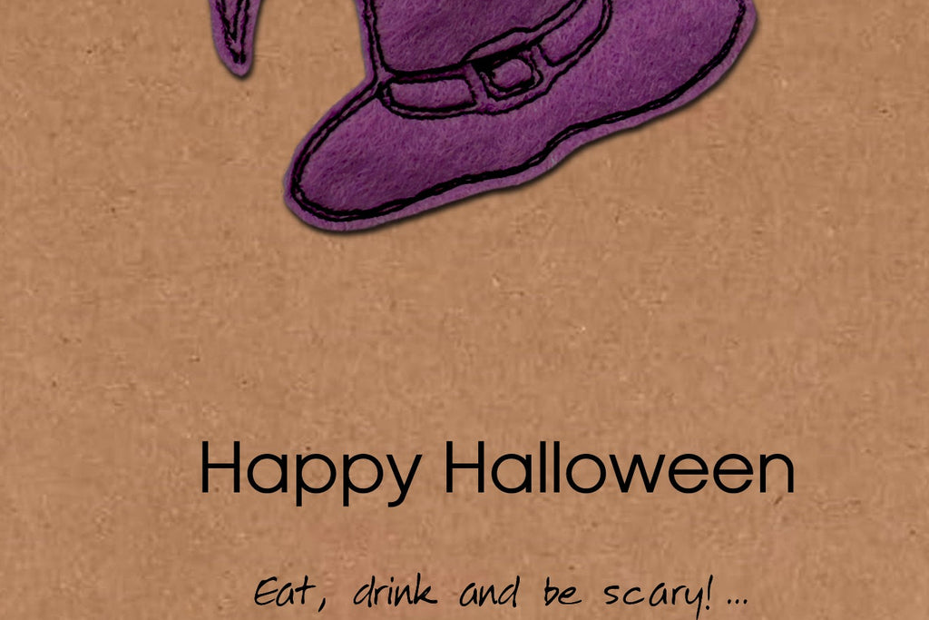 Purple witch hat on a brown background with 'Happy Halloween' text.