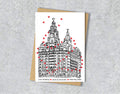 Wedding / Anniversary card with a black and white textile illustration of Royal Liver Building Liverpool and red hearts with personalised text.