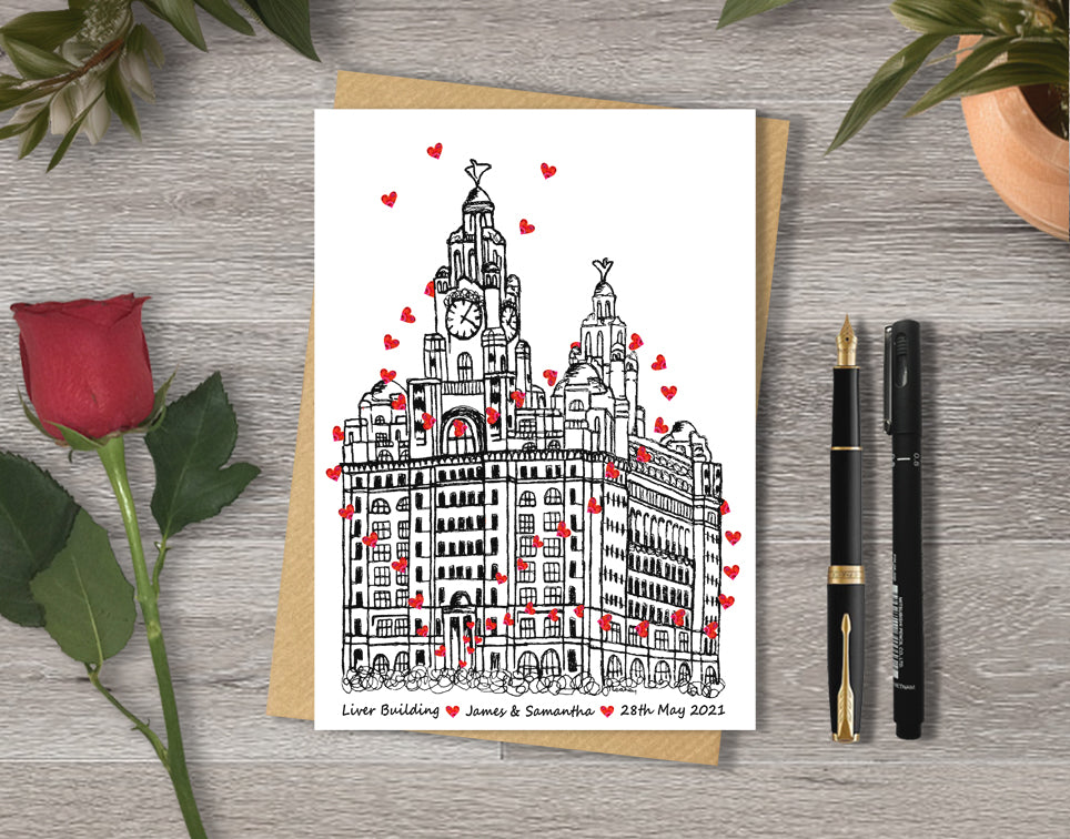 Wedding / Anniversary card with a black and white textile illustration of Royal Liver Building Liverpool and red hearts with personalised text.
