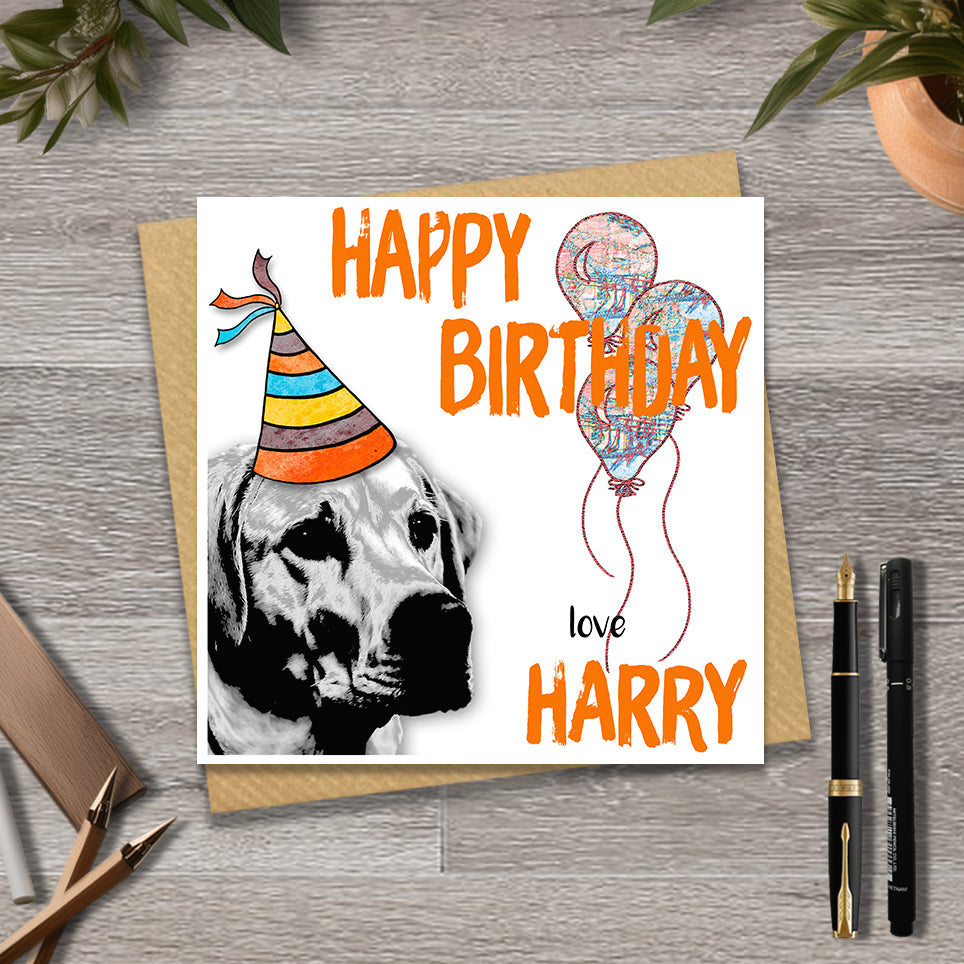 Birthday card with a Labrador wearing a party hat and balloons, with personalised text.