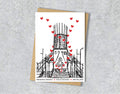 Wedding / Anniversary card with a black and white textile illustration of Metropolitan Cathedral Liverpool and red hearts with personalised text.