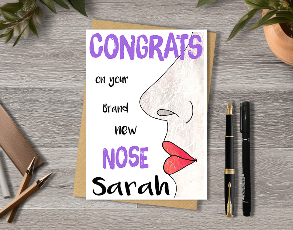 Congrats card with a female nose illustration saying "congrats on your brand new nose" with personalised text.