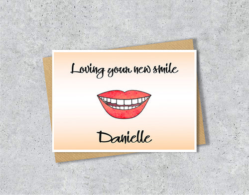 Greeting card with a smiley mouth illustration saying 'Loving your new smile' with personalised text.