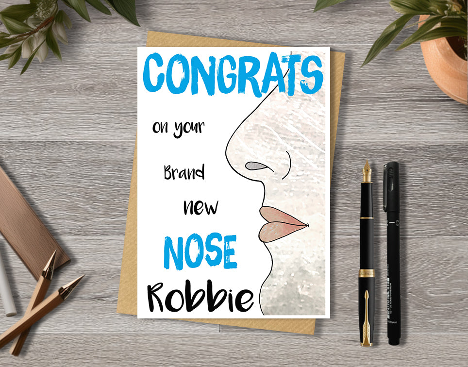 Congrats card with a male nose illustration saying "congrats on your brand new nose" with personalised text.