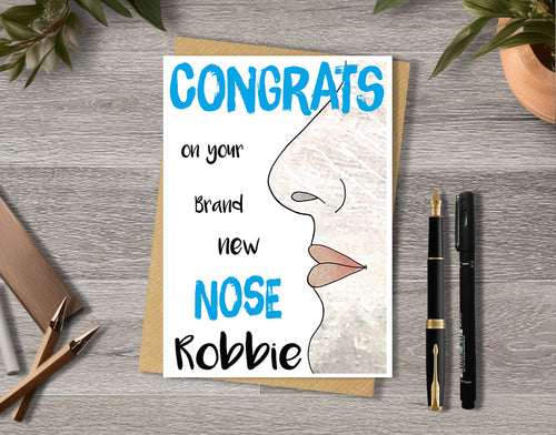 Congrats card with a male nose illustration saying "congrats on your brand new nose" with personalised text.