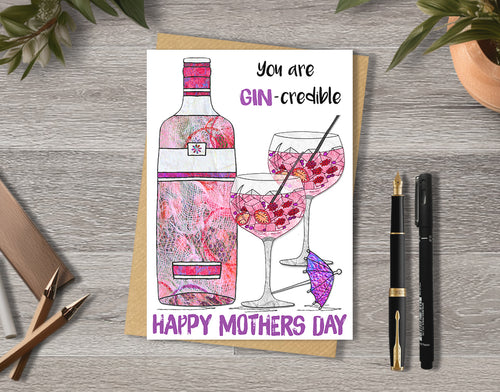 Mother's day card with a colorful illustration of pink gin bottle and glasses and text 'you are gin-credible'.