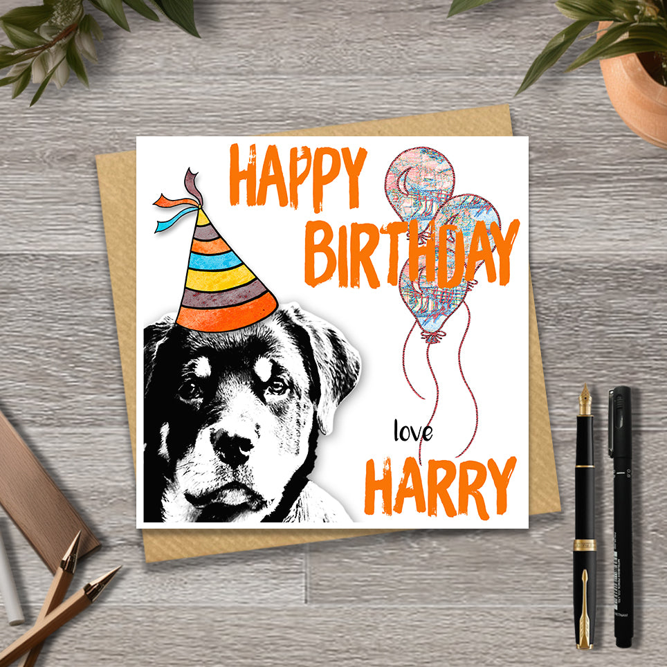 Birthday card with a Rottweiler wearing a party hat and balloons, with personalised text.