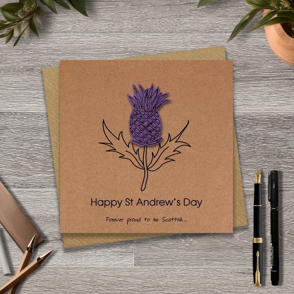 Kraft St Andrew's day card with a embroidered thistle design and text