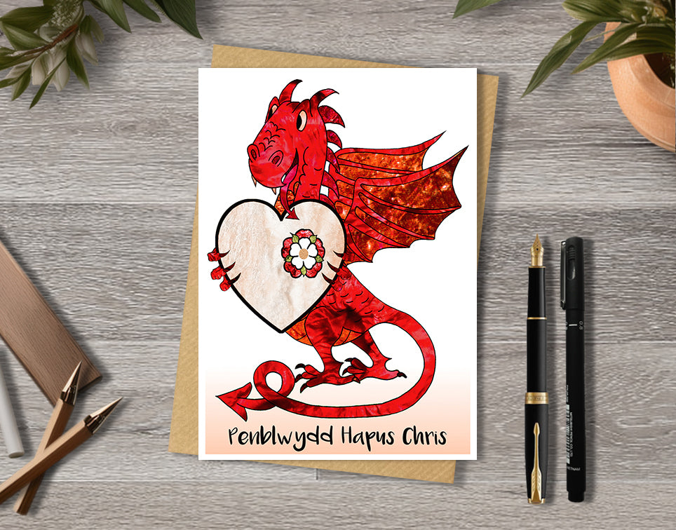 Welsh Birthday card with a red dragon design and a heart with personalised text.