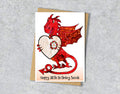 Birthday card with a red dragon design and a heart with personalised text.