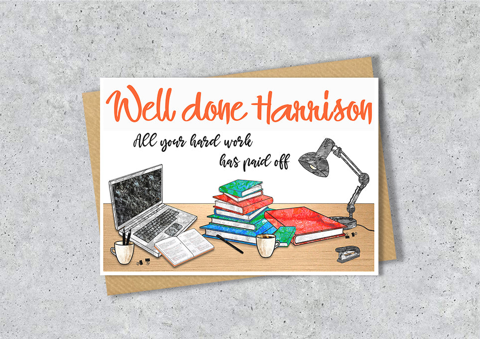 Greeting card with 'Well done Harrison' text and a illustration of a desk with books, laptop, and lamp.